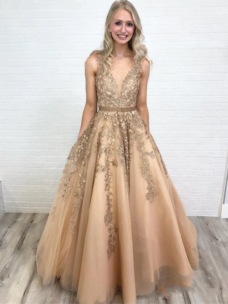 Shop the Stunning Champagne A-Line Applique Beaded V-Neck Sleeveless Tulle Prom Dress at JLDressCA Shop the Stunning Champagne A-Line Applique Beaded V-Neck Sleeveless Tulle Prom Dress at JLDressCA