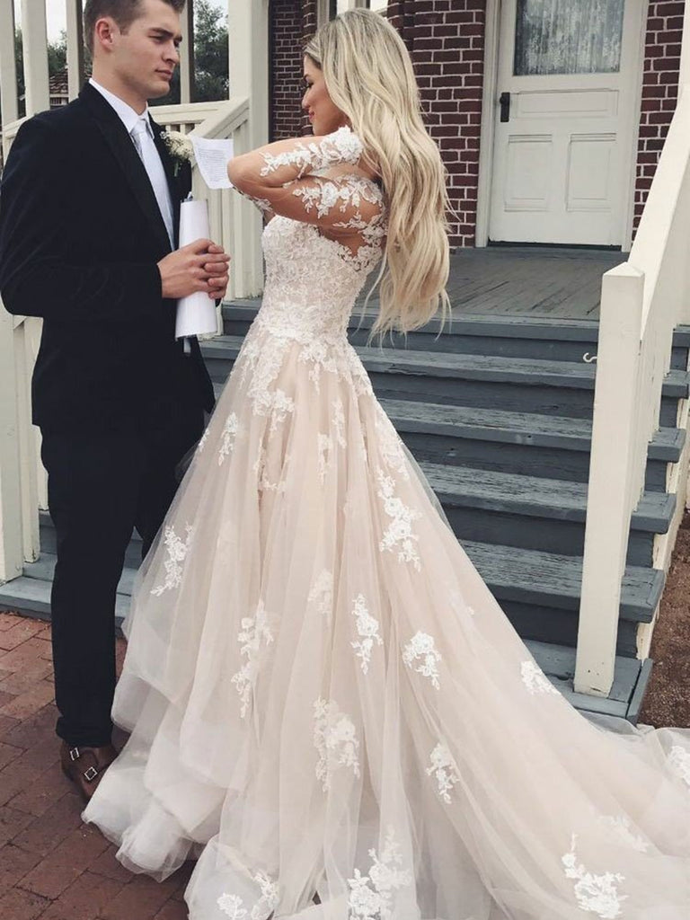lace wedding dress with champagne underlay Champagne A-line Wedding Dresses V-neck Lace Appliqued Tulle Bridal Go Viniodress